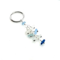 white and blue key chain