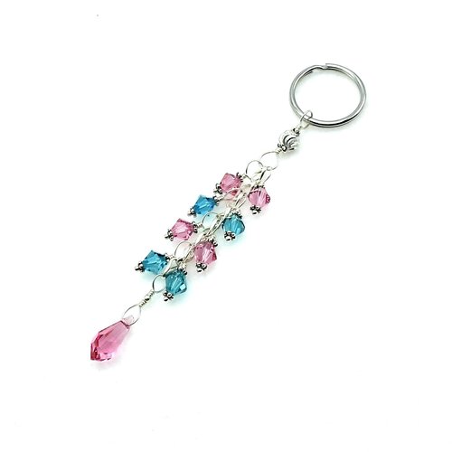 4 1/8" (10.5cm) in length from the top of the keyring